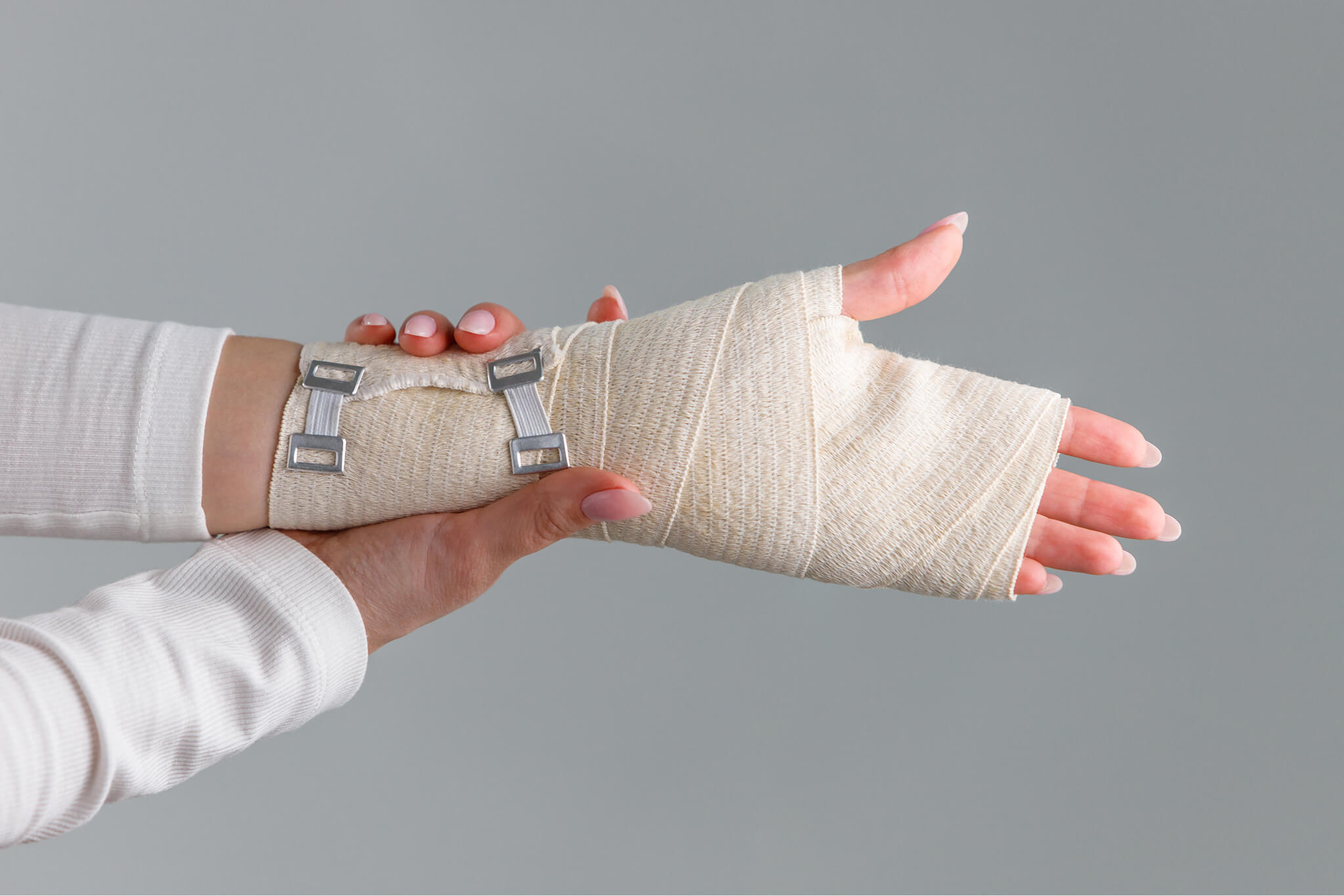 woman-arms-touching-her-painful-wrist-with-elastic-2026-01-08-06-36-40-utc 1